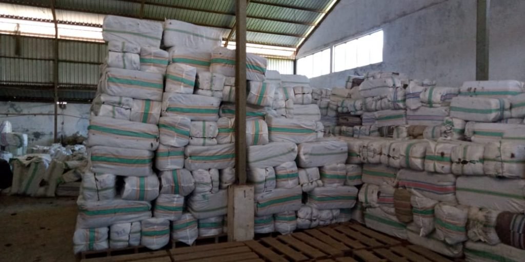Stacks of bagged dried seaweed inside a Kospermindo warehouse