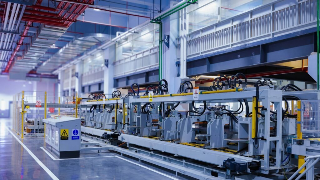 Large machine inside a factory building