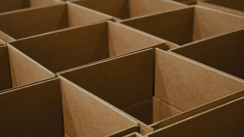 Rows of open brown boxes