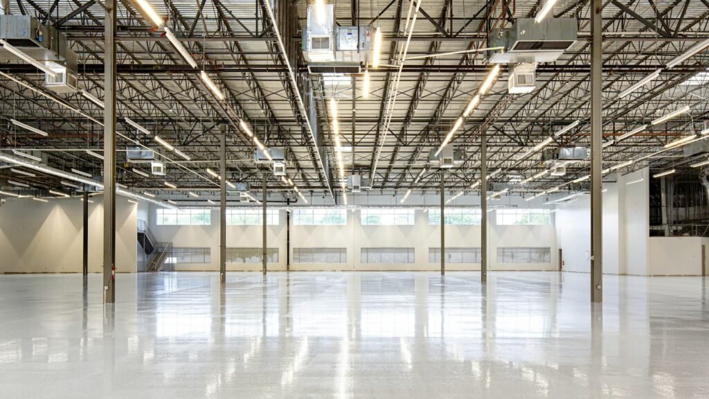 Empty warehouse interior with a concrete floor