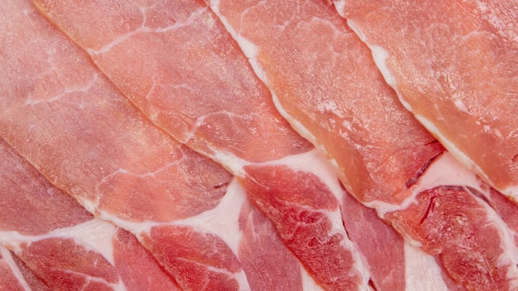 Raw meat on a white surface
